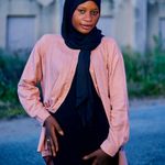 Portrait of a smiling confident woman in her forties.